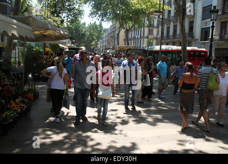 Tourists walking down las Ramblas in Barcelona Stock Photo