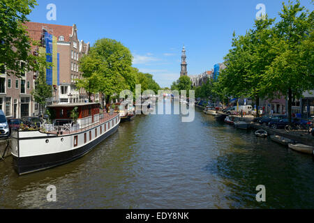 View along Prinsengracht canal, looking towards Westerkerk church, Amsterdam, North Holland, Netherlands, Europe Stock Photo