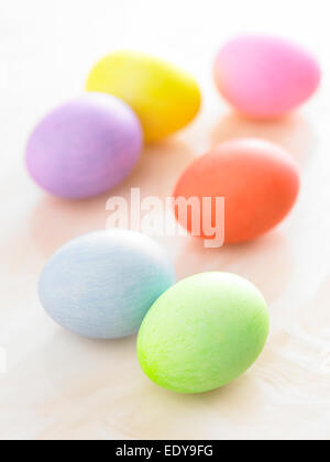 Easter Holiday eggs on tan background Stock Photo