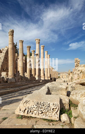 Main street Cardo Maximus, columns, relief, ancient Roman city of Jerash, part of the Decapolis, Jerash, Jerash Governorate Stock Photo