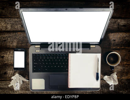 Blank laptop and cell phone screens on wooden background Stock Photo