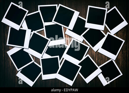 Large group of blank old camera fils on wooden background Stock Photo