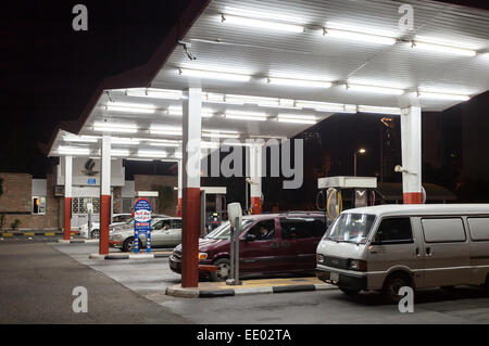 Petrol station in the city of Kuwait at night Stock Photo