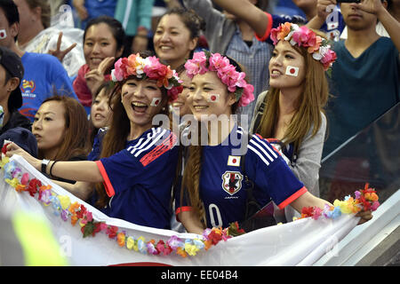Newcastle, Australia. 12th Jan, 2015. Supporters of Japan celebrate victory after a Group D match against Palestine at the AFC Asian Cup in Newcastle, Australia, Jan. 12, 2015. Japan won 4-0. Credit:  Qin Qing/Xinhua/Alamy Live News Stock Photo