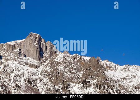 Le Brévent mountain summit with gondola cable car in French Alps in winter. Chamonix-Mont-Blanc Haute Savoie Rhone-Alpes France Stock Photo