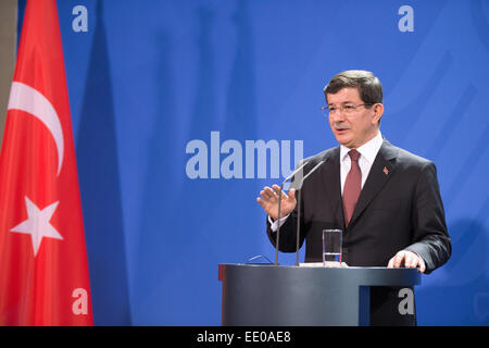Berlin, Germany. 12th Jan, 2015. Turkish Prime Minister Ahmet Davutoglu speaks at a press conference with German Chancellor Angela Merkel at the Federal Chancellery in Berlin, Germany, 12 January 2015. Questions of bilateral and European relations, as well as economic and international questions were the main theme of talks over lunch. Credit:  dpa picture alliance/Alamy Live News Stock Photo
