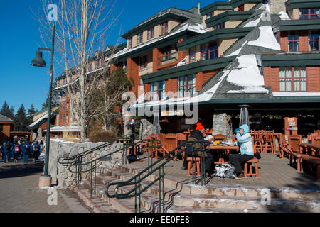 USA California CA South Lake Tahoe Heavenly Ski Resort Village Winter in the Sierra Mountains - People eating outside Stock Photo