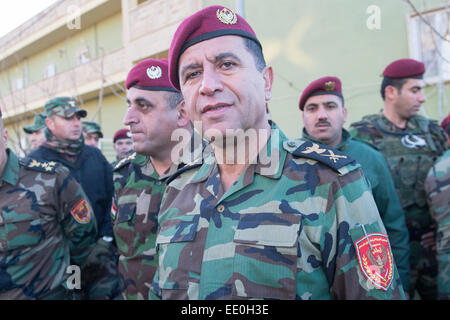 Erbil, Iraq. 12th Jan, 2015. Peshmerga major general Asis Waisi waits for the German Minister of Defence at the Zeravani Training Centre in Bnaslava near Erbil, Iraq, 12 January 2015. Photo: MAURIZIO GAMBARINI/dpa/Alamy Live News Stock Photo
