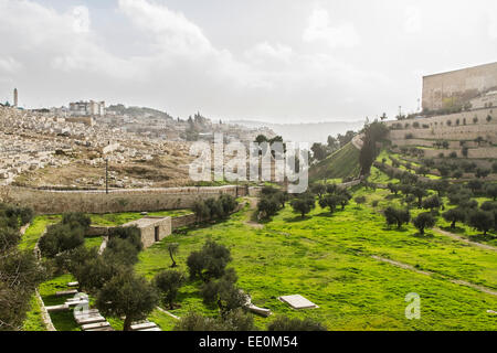 Kidron Valley. Left the Jewish cemetery on the Mount of Olives, then village of Silwan, in the center of the tomb of Absalom and Stock Photo