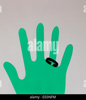 Right Hand print in green color and ring on the ring finger with full view Stock Photo