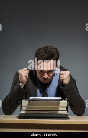 Inspired young author typing Stock Photo