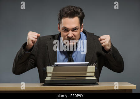 Inspired young author typing Stock Photo