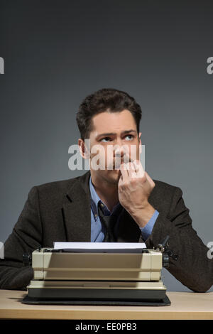 Inspired young author typing Stock Photo