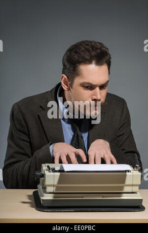 Inspired young author typing Stock Photo