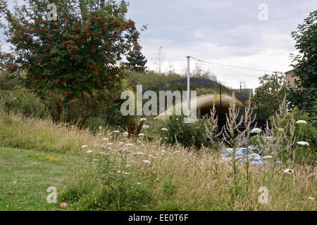 The 'Green' Bridge at Mile End, a pedestrian walk over the busy Mile End Road, London. Stock Photo