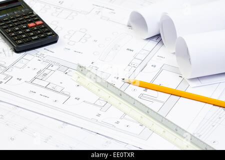 Architectural blueprint with a pencil and scale ruler on a work Stock ...