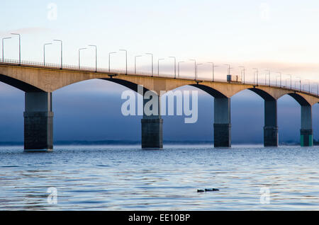 The Oland bridge in Sweden in the first morning sun. The bridge is one of the longest bridges in Europe and is connecting the is Stock Photo