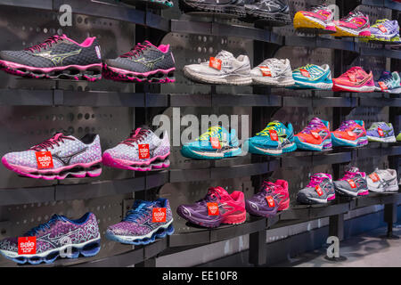 An athletic shoe display in a Foot Locker store in New York on Saturday, January 10, 2015. Credit Suisse recently downgraded the retailers stock to 'neutral', previously 'outperform', calling it a strong performer citing the risk of buying the stock vs. the cost of the stock.  (© Richard B. Levine) Stock Photo