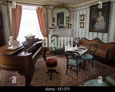 Livingroom or Parlor of  a Pioneer house. The sitting room in a well to do house in the Village. Stock Photo