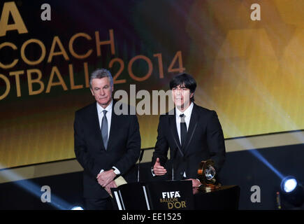 Zurich, Switzerland. 12th Jan, 2015. Germany's coach Joachim Loew (R) speaks after receiving the 2014 FIFA World Coach of the Year for Men's Football award from Switzerland's German coach Ottmar Hitzfeld during the FIFA Ballon d'Or award ceremony at the Kongresshaus in Zurich, Switzerland, Jan. 12, 2015. Credit:  Zhang Fan/Xinhua/Alamy Live News Stock Photo