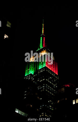 Manhattan, New York, USA. 12th Jan, 2015. The Empire State Building tower lights are lit for tonight's College Football National Championship game between No. 2 Oregon (green) and No. 4 Ohio State (red), Monday, January 12, 2015. Credit:  Bryan Smith/ZUMA Wire/Alamy Live News Stock Photo