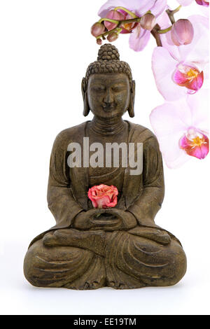 Buddhastatue, Orchidee Stock Photo