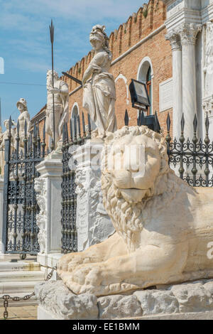 Lion sculpture at the main entrance, Venetian Arsenal, Castello district, Venice, Veneto Region, Italy Stock Photo