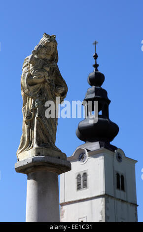 The Blessed Virgin Mary with baby Jesus in front of the parish church in Tuhelj, Croatia Stock Photo