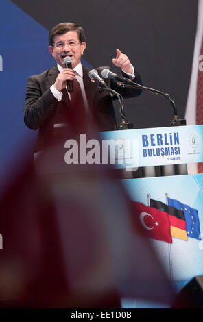 Berlin, Germany. 12th Jan, 2015. The Turkish Prime Minister Ahmet Davutoglu speaks to citizens of Turkish origin in the Tempodrom in Berlin, Germany, 12 January 2015. Photo: Joerg Carstensen/dpa/Alamy Live News Stock Photo