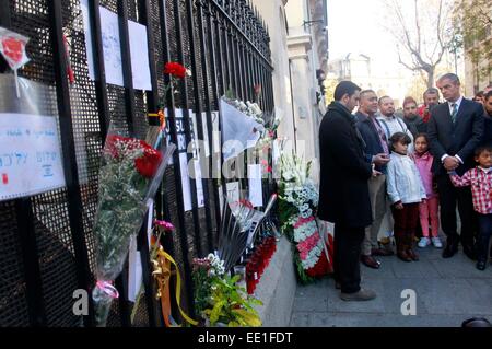 Members of the Islamic Community offer a wreath during a meeting with the French Ambassador Jerome Bonnafont in memory of the victims of the Paris terrorist attacks in front of the Embassy of France on January 11, 2015 in Madrid, Spain. Arabs Culture Foundation (FUNCA) called for a demonstration with the support of more than fifty mosques under the slogan 'Against terrorism and radicalisms' in reaction to several terrorist attacks that started inside Charlie Hebdo magazine's office, and had taken the lives of seventeen people and three suspects in Paris this week/picture alliance Stock Photo