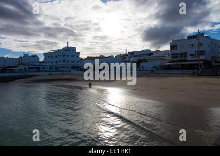 Shimmering sand on Corralejo town beach Canary islands Spain Stock Photo