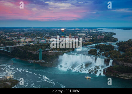 View of Rainbow Bridge and The American Falls, Niagara Falls, Niagara, border of New York State, and Ontario Canada Stock Photo