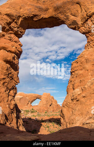 South Window Arch seen through Turret Arch, Arches National Park, Utah, United States of America, North America Stock Photo