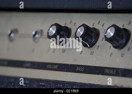 Guitar amp with bass knob in focus. Stock Photo