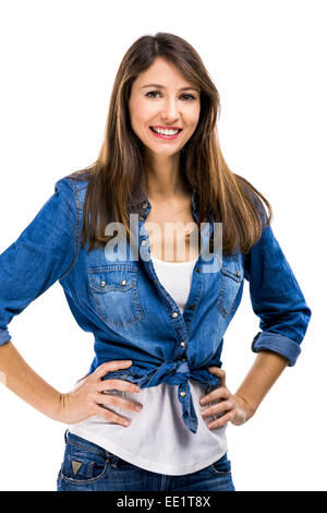 Beautiful and attractive woman wearing  a jeans shirt, isolated over white background Stock Photo