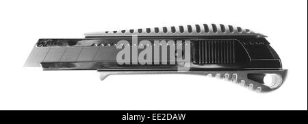 metal stationery knife with replaceable blades on a white background Stock Photo