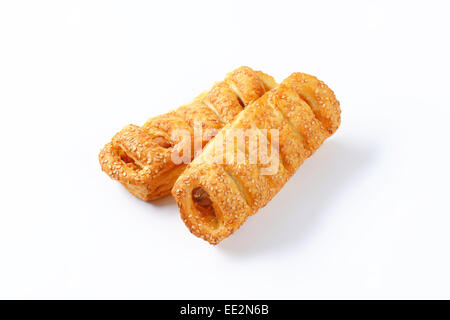 Sausage rolls topped with sesame seeds Stock Photo