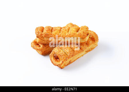 Sausage rolls topped with sesame seeds Stock Photo