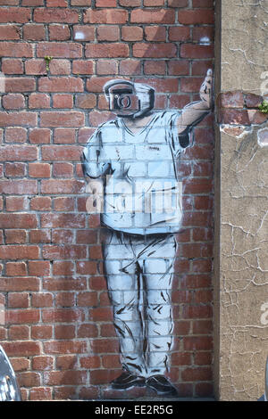 Graffiti Art, Figure with CCTV Camera Head Stock Photo