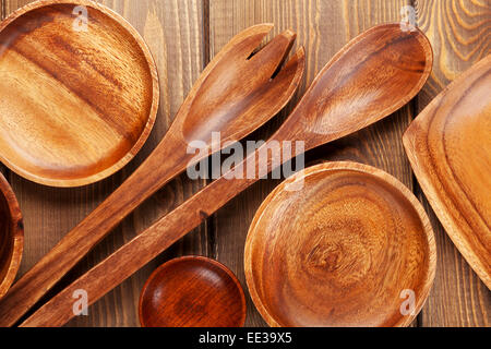 Wood kitchen utensils over wooden table background Stock Photo