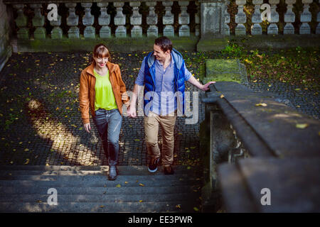 Young couple holding hands, Munich, Bavaria, Germany