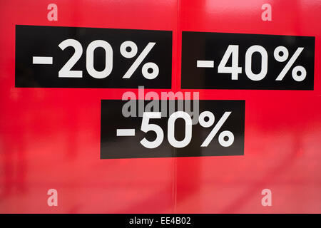 discount percentage amounts in shop window Stock Photo