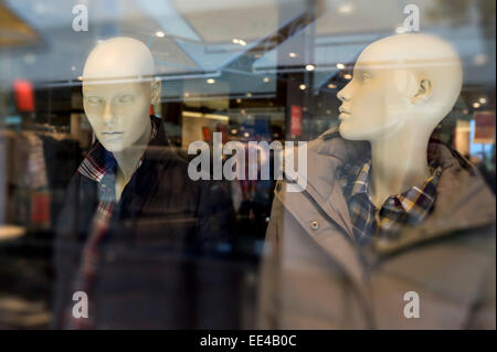 two male mannequins in shop window in Portugal Stock Photo