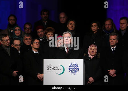 Berlin, Germany. 13th Jan, 2015. German President Joachim Gauck (front) speaks during a vigil paying homage to the victims of French Charlie Hebdo attack and ensuing armed standoffs in Berlin, Germany, on Jan. 13, 2015. Credit:  Zhang Fan/Xinhua/Alamy Live News Stock Photo