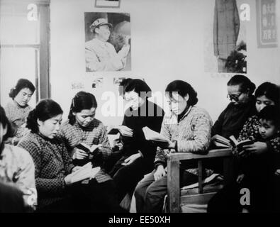 Chinese Housewives' Study Group Reading the Writings of Chairman Mao Zedong, Shenyang, China, 1969 Stock Photo