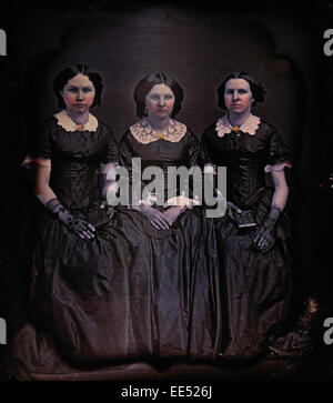 Three Women in Long Dresses with Lace Collars, Portrait, Daguerreotype, circa 1850's Stock Photo