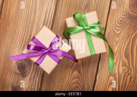Gift boxes on wooden table background Stock Photo