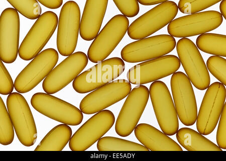 Fish oil gel pills laying on white background Stock Photo