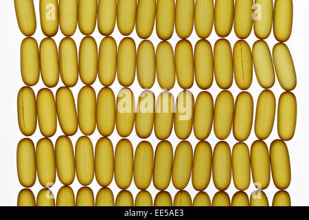 Fish oil gel pills laying on white background Stock Photo