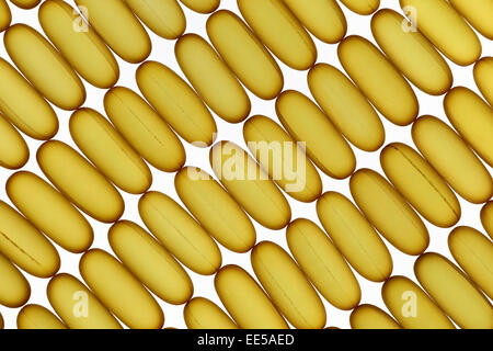 Fish oil gel pills laying on white background Stock Photo